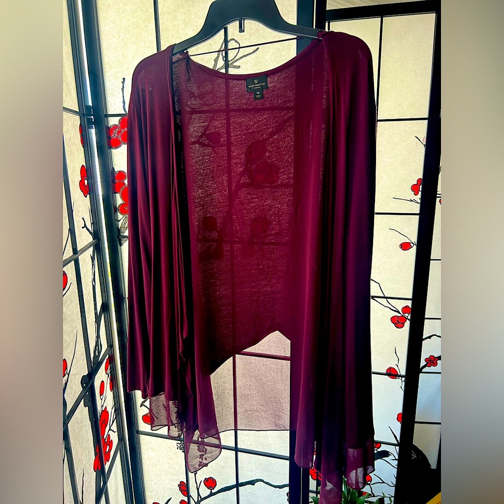 Women’s long sleeve dressy cover top in burgundy by Worthington. 1X